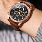 Montre OLEVS 3660 portée au poignet — bracelet cuir brun