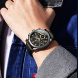 Montre OLEVS 3660 portée au poignet — boîtier noir